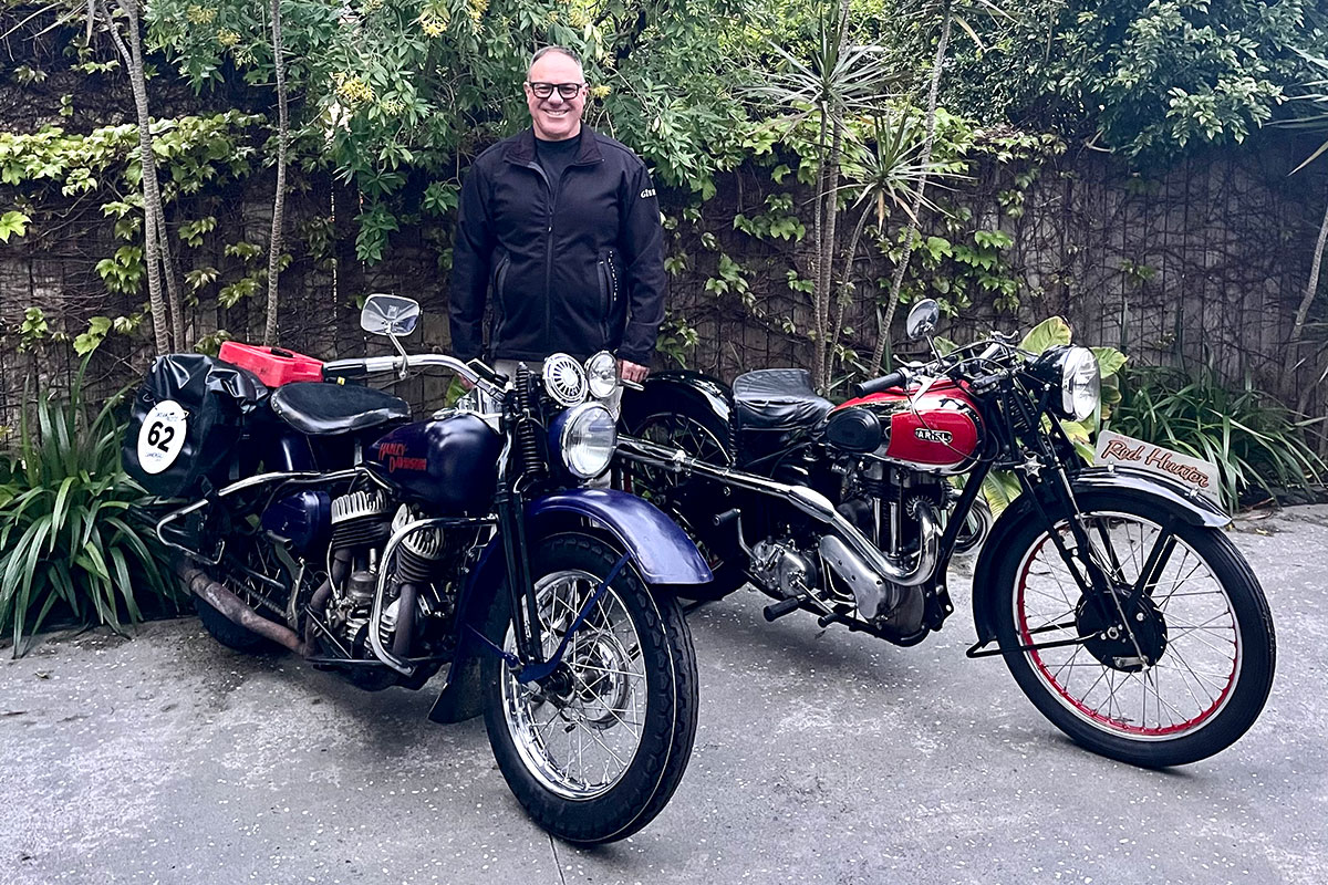 Derek with his two antique motorcycles